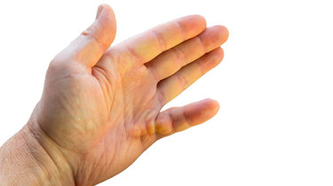 Billedet viser en hånd med kuskefinger.